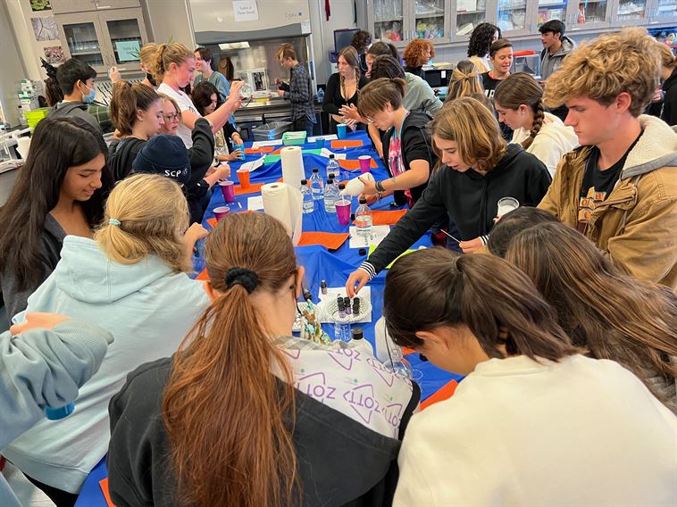 Students making slime for Halloween